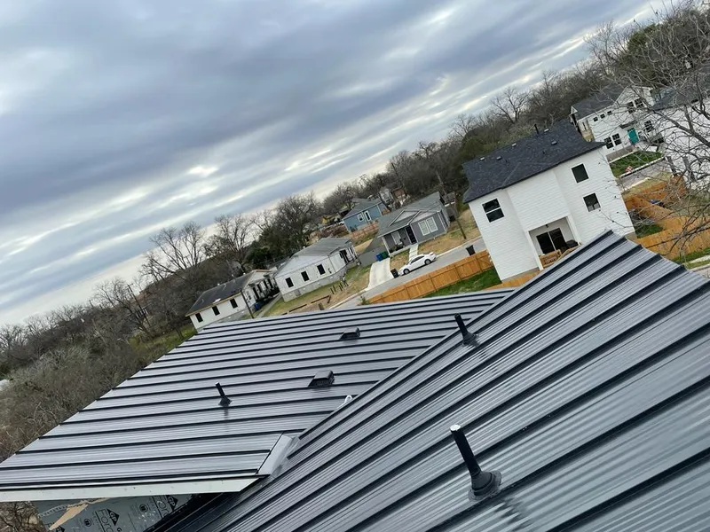 Standing seam metal roof panels with vents for Skylight Repair in Wheatfield